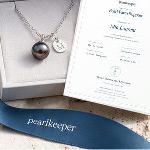 Pearl necklace and personalized sample certificate in a gift-box mockup